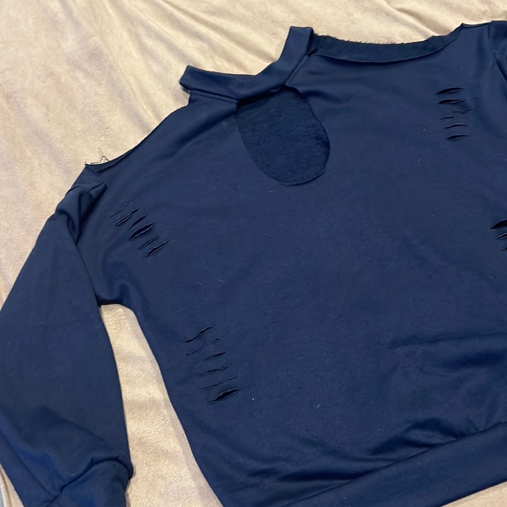 Dark blue distressed sweat shirt open shoulders with open neck.size medium